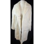 SANDRO, WHITE FUR COAT With long sleeves, hook and eye fascinators, notch lapel collar (size 10). A