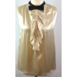 DOLCE & GABBANA, BEIGE SILK TOP With black bow, along with another in black silk (size 12). B&C