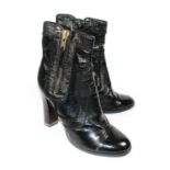 STELLA MCCARTNEY, BLACK PATENT LEATHER ANKLE BOOTS With a side zip, slight wedge heel (size 39). (