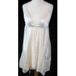 ANN DEMEULEMEESTER, WHITE SILK DRESS With spaghetti straps, sweetheart neckline and hanging