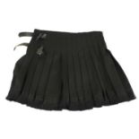 BURBERRY, BLACK WOOL SKIRT With pleated design, two black side belt buckles and tasselled hemline (