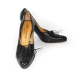 YVES SAINT LAURENT, BLACK LEATHER HEELS With decorative lace up front (size 39). (heel 9cm) B