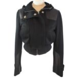 MIU MIU, BLACK 'WOOL' JACKET With silver popper buttons and zip along front, leather shoulder and