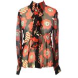 OSSIE CLARK, BLACK SILK SHIRT With large red floral and grey spiral design throughout, ruffled front