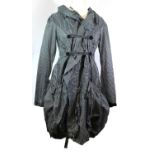 MARITHÉ & FRANÇOIS GIRBAUD, BLACK AND WHITE CHECK RAINCOAT With large pockets, black buttons, back