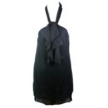 BCBGMAXAZRIA, BLACK SILK DRESS With one shoulder, black sequin hemline and ruffled bow near neckline