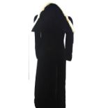 NO LABEL, BLACK VELVET COAT With long sleeves, fabric tie along neck, button at neck (size 12). B