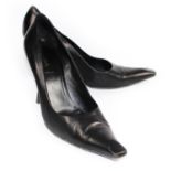 PRADA, BLACK LEATHER HEELS With pointed and flattened toe (size 39.5). (heel 9.5cm) B