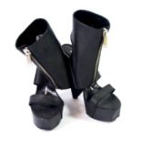 GARETH PUGH, BLACK LEATHER BOOTS With foot strap, silver zip along front, cut out panels of front