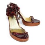 DOLCE & GABBANA, MAROON PATENT LEATHER SANDALS With a flower design on the ankle straps,