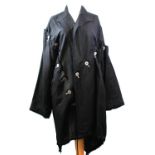 YOHJI YAMAMOTO, BLACK LINEN COAT With grey striped buttons along front and left sleeve, adjustable