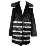 SHRIMPS, BLACK FAUX FUR COAT With white lace horizontal striped decoration (size 10). A