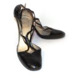CHRISTIAN LOUBOUTIN, BLACK LEATHER SANDALS With a frontal connective design (size 38½). (heel 10.