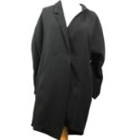 JEAN-PIERRE BRAGANZA, BLACK WOOL COAT With slight ruffled mid length sleeves, front pockets, notch