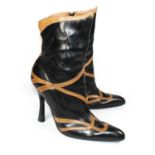 STEPHANE KÉLIAN, BLACK LEATHER ANKLE BOOTS With a camel coloured leather band interweaving design,