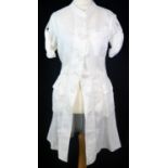 JEAN PAUL GAULTIER, WHITE LINEN DRESS With white buttons along middle, three pockets along front,