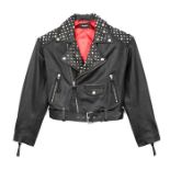 THE KOOPLES, BLACK LEATHER JACKET With silver front zip, two zip up pockets, buckle belt, metal star