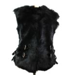 RIKA, BLACK LEATHER WAISTCOAT With black fur front, buckles along front, sleeveless, one hidden