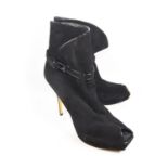 LOUIS VUITTON, BLACK SUEDE HEELED ANKLE BOOTS With an open toe and a thin buckle patent trimmed
