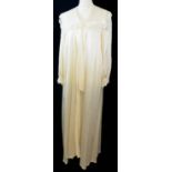 SAXON, CREAM SILK DRESSING GOWN With white lace detail along hemline and sleeves (size M). A+