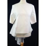 CELINE, WHITE COTTON SHIRT Zipped back with tails (size 42). A