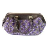 LOUIS VUITTON, PURPLE HANDBAG With purple sequined design, brown leather handles and luggage tag,