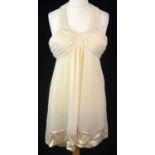 JASMINE DI MILO, CREAM SILK MINI DRESS With cream silk lining and strapless sweetheart neckline (