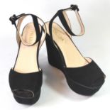 PRADA, BLACK SUEDE WEDGE HEELS With ankle strap with circle buckle, open toe (size 39). (heel 11.