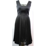 PRADA, BLACK VISCOSE DRESS With pleated skirt, sleeveless and small black lace chest cover (size