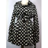 BETSEY JOHNSON, BLACK COTTON COAT With large black heart shaped buttons, white polka dots, slight