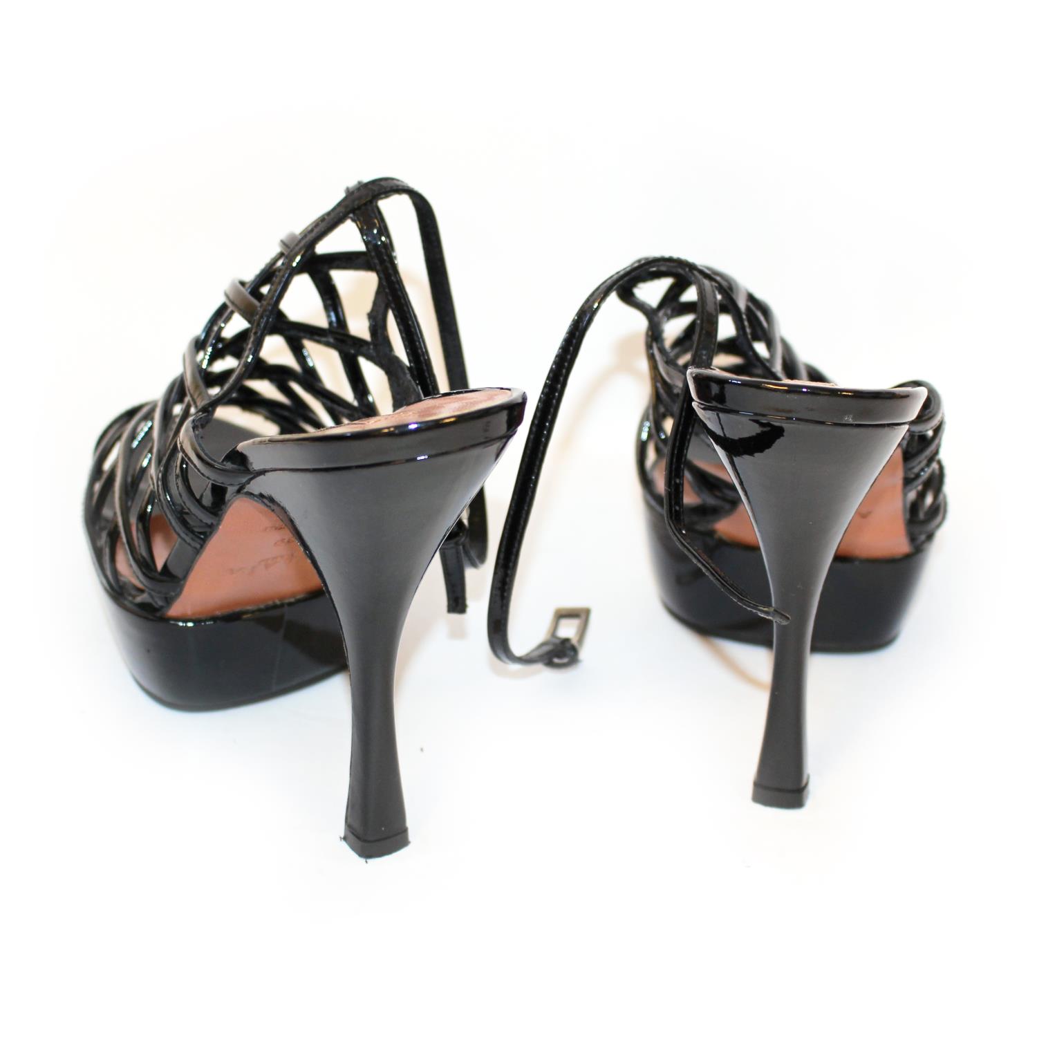 ALAÏA, PATENT LEATHER HEELS With lattice strapwork and tapering heel (size 39). (heel 12cm) A - Image 5 of 5