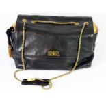 CHLOÉ, BLACK LEATHER SHOULDER BAG With golden chain handle, side golden metal tassel. A