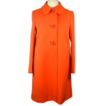 PRADA, ORANGE WOOL COAT With large orange buttons along centre and popper button at bottom, long