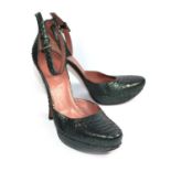 ALAÏA, SNAKESKIN SANDALS With a slightly arched inwards heel, ankle strap (size 39). (heel 12cm) A
