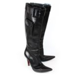 VIVIENNE WESTWOOD, BLACK LEATHER KNEE-HIGH BOOTS With an adjustable buckle at the top, a side zip,