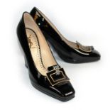 YVES SAINT LAURENT, A PAIR OF BLACK PATENT LEATHER HEELS With buckle embellishment. size 39 mint