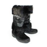 TECNICA, BLACK GOAT FUR SNOW BOOTS With suede side tassel and rubber sole (size 39). (heel 4cm) A