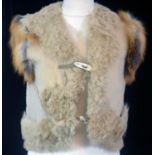 DOLCE & GABBANA, FUR COAT With sheep base and fox trim, shawl lapel neckline and one bone like