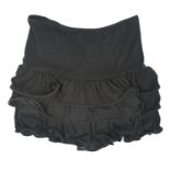 DANCE AMERICA, BLACK POLYESTER SPORT SKIRT With ruffled layers of fabric along bottom, stretch