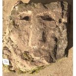 A CARVED STONE CUBE CORBEL Carved with a crowned Medieval portrait. (approx 32cm x 22cmx 15cm)