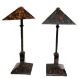 A PAIR OF ART DECO DESIGN LAMPS With faux tortoiseshell shades and tiled decoration, raised on a