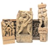 FOUR INDIAN WOODEN ANTIQUE EROTIC CARVINGS. (largest 68cm)