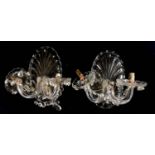 A SET OF THREE EARLY 20TH CENTURY CRYSTAL GLASS WALL SCONCES Having an oval shell form back and