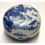 A 19TH CENTURY CHINESE BLUE AND WHITE POT AND COVER Decorated in Willow pattern. (diameter 11cm)