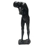 A BRONZED RESIN STATUE Nude male, indistinctly signed. (52cm)