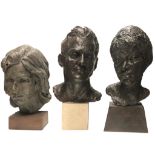 A GROUP OF THREE STUDIO PORTRAIT BRONZED PLASTER BUSTS On stands. (largest 46cm)
