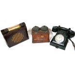 BAKELITE, A MID 20TH CENTURY BLACK TELEPHONE Sold together with a mid 20th Century Bakelite radio,