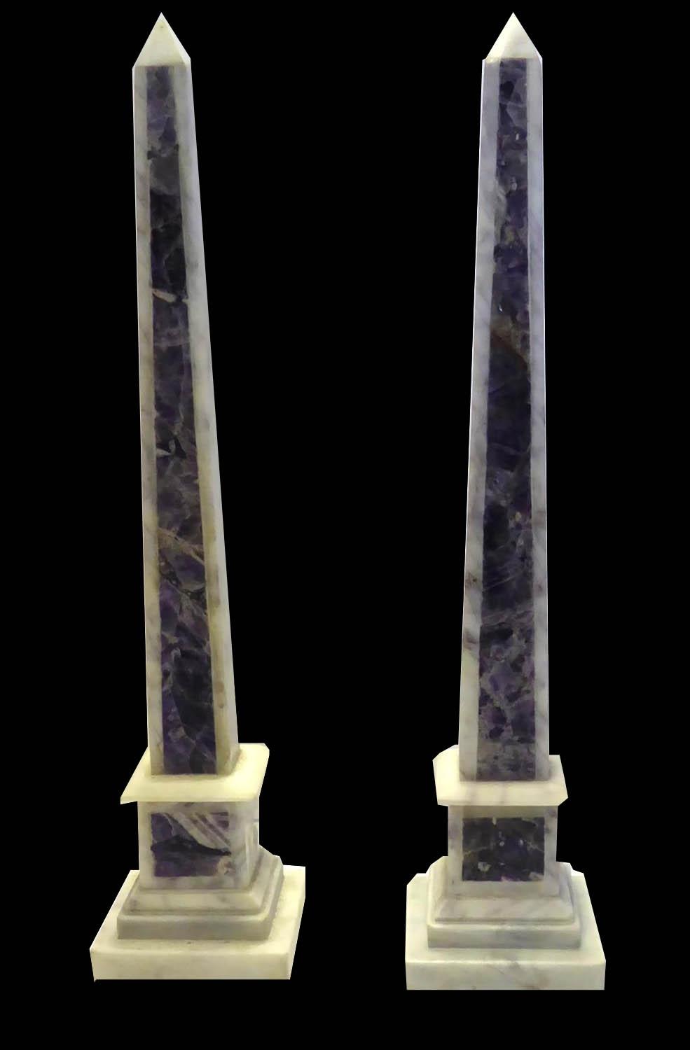 A PAIR OF ITALIAN AMETHYST AND WHITE MARBLE PYRAMID FORM OBELISKS On a square pedestal base. (approx