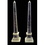 A PAIR OF ITALIAN AMETHYST AND WHITE MARBLE PYRAMID FORM OBELISKS On a square pedestal base. (approx
