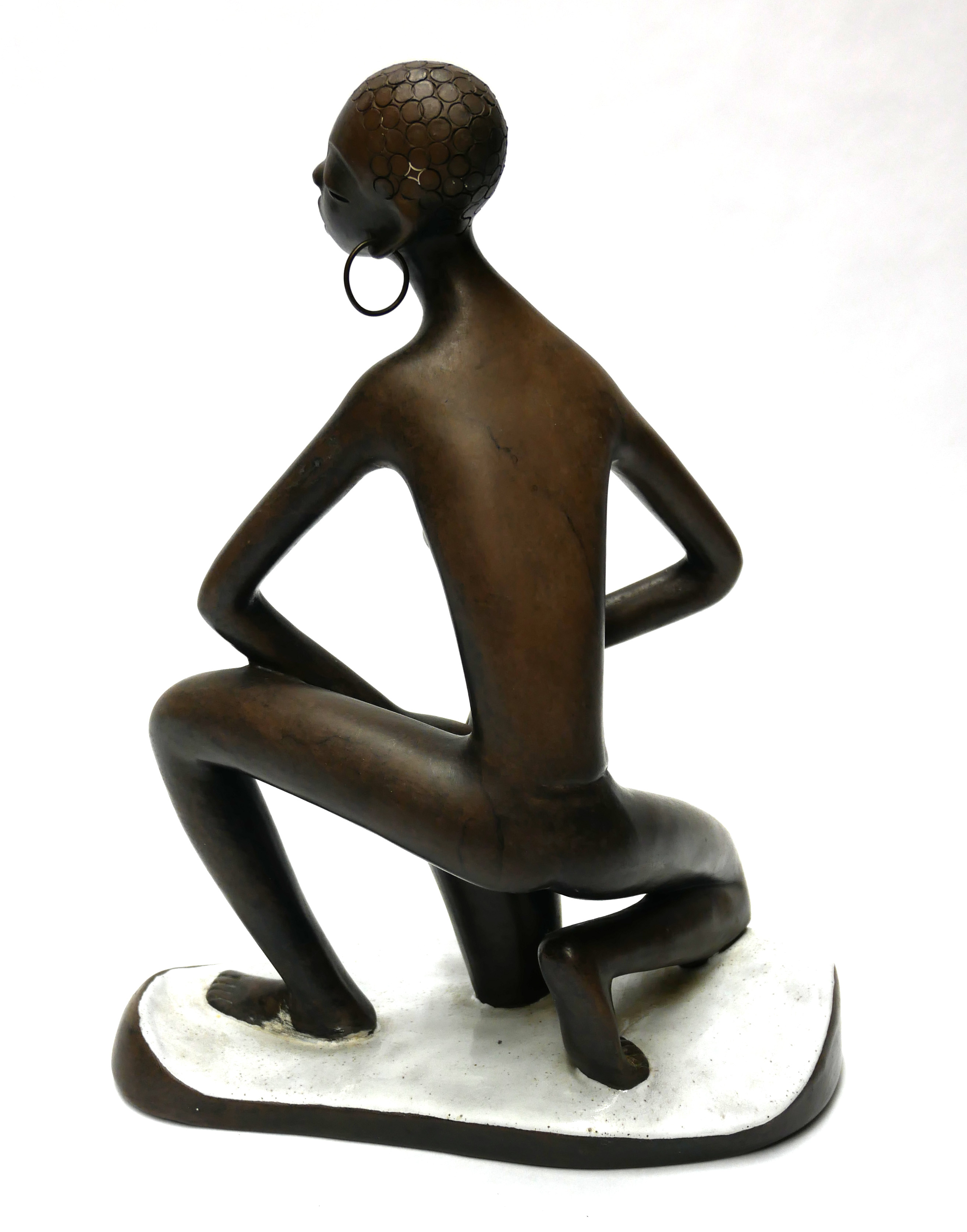 LEOPOLD ANZENGRUBER, A MID 20TH AUSTRIAN POTTERY FIGURINE Native African drummer with elongated - Image 2 of 2